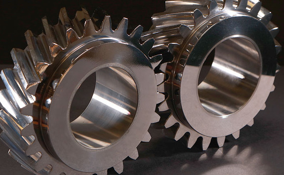 Two gears moving into each other